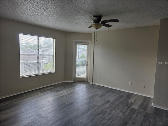 2030 Cascades Blvd Unit 204, Kissimmee, FL 34741 - unfurnished room featuring dark wood-type flooring, ceiling fan, and a textured ceiling