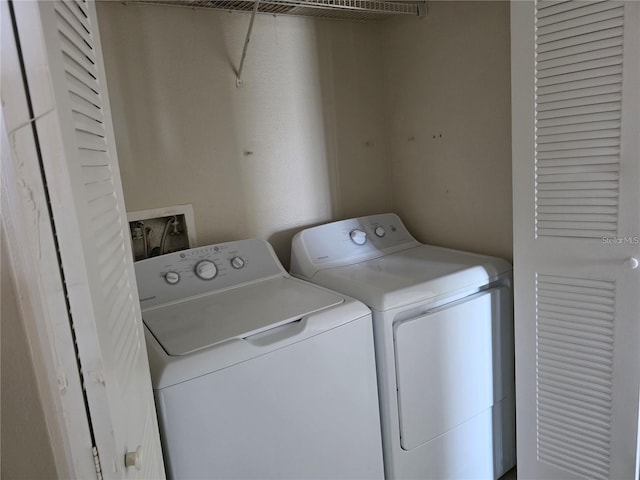 2030 Cascades Blvd Unit 204, Kissimmee, FL 34741 - laundry area featuring washing machine and clothes dryer