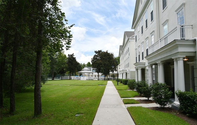 267 Goldenrain Dr Unit 30, Celebration, FL 34747 - view of home's community featuring a lawn
