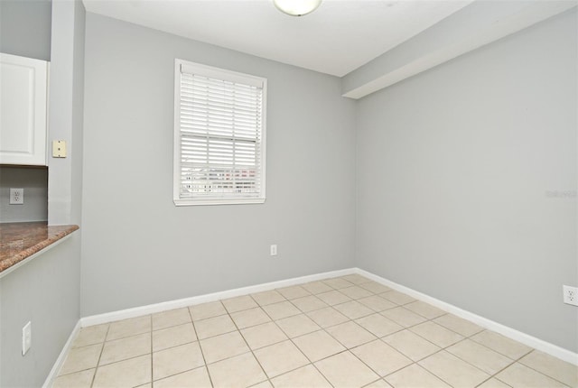 267 Goldenrain Dr Unit 30, Celebration, FL 34747 - spare room with baseboards