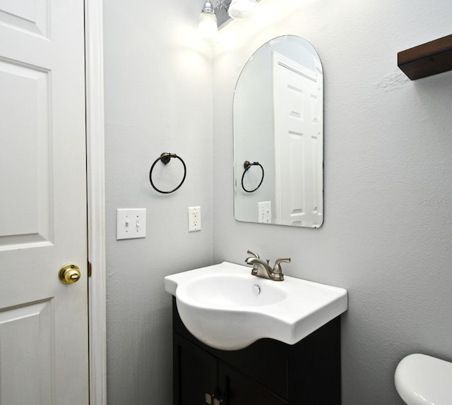 267 Goldenrain Dr Unit 30, Celebration, FL 34747 - bathroom featuring vanity and toilet