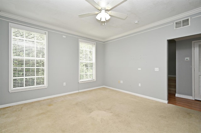 267 Goldenrain Dr Unit 30, Celebration, FL 34747 - spare room with carpet flooring, ornamental molding, a ceiling fan, and a smoke detector