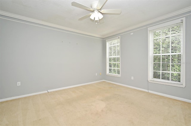 267 Goldenrain Dr Unit 30, Celebration, FL 34747 - empty room featuring ornamental molding, light colored carpet, healthy amount of natural light, and ceiling fan