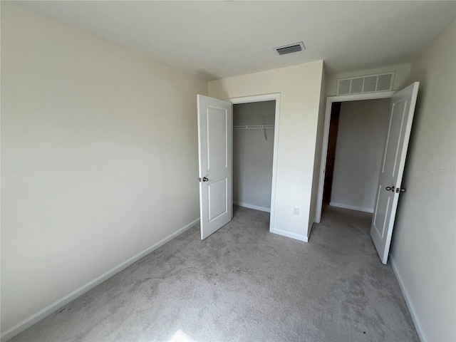 2626 Skyline Loop, Kissimmee, FL 34758 - unfurnished bedroom featuring carpet floors and a closet