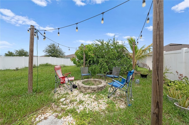 739 Jefferson, Davenport, FL 33837 - fenced backyard with a fire pit