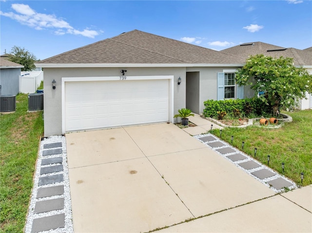 739 Jefferson, Davenport, FL 33837 - single story home featuring roof with shingles, stucco siding, and driveway