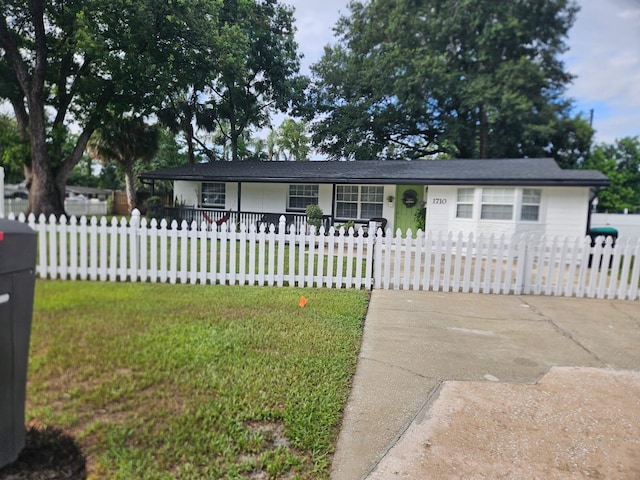 1710 Thor Ave, Apopka, FL 32703 - view of front facade with driveway and a fenced front yard