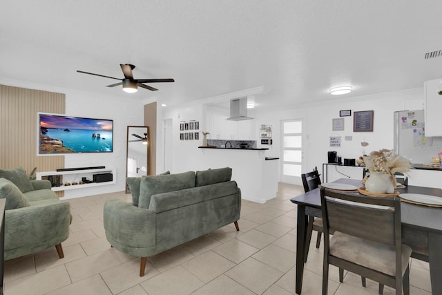 1710 Thor Ave, Apopka, FL 32703 - living area featuring a ceiling fan, ornamental molding, and light tile patterned floors