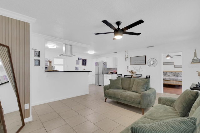 1710 Thor Ave, Apopka, FL 32703 - living room featuring ceiling fan, crown molding, and light tile patterned floors