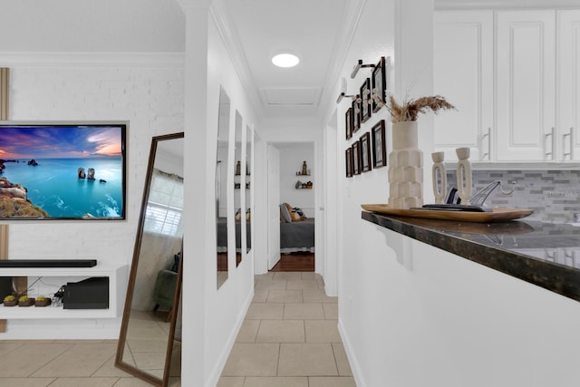 1710 Thor Ave, Apopka, FL 32703 - corridor featuring light tile patterned floors and crown molding