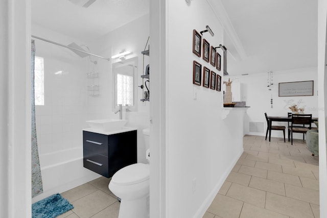 1710 Thor Ave, Apopka, FL 32703 - full bathroom featuring vanity, tile patterned flooring, crown molding, and shower / bath combo with shower curtain