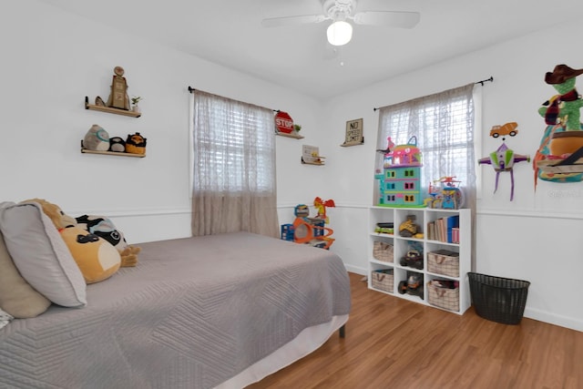 1710 Thor Ave, Apopka, FL 32703 - bedroom featuring wood finished floors and a ceiling fan