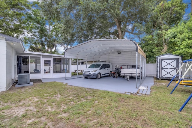 1710 Thor Ave, Apopka, FL 32703 - view of parking featuring a detached carport and a storage unit