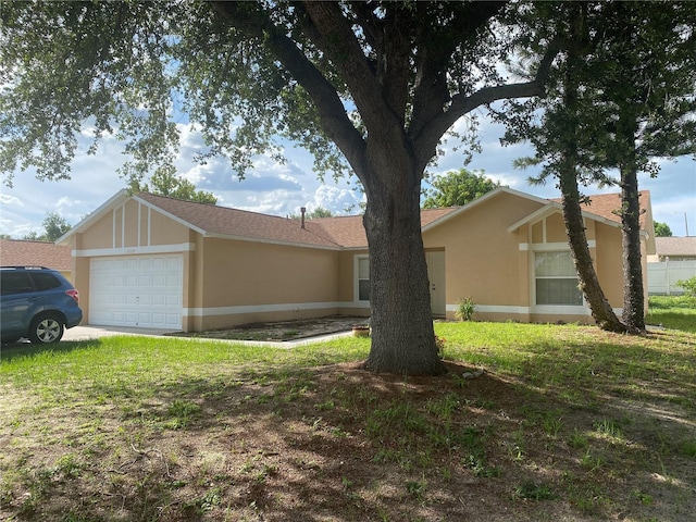 13327 Caspian Ln, Clermont, FL 34711 - ranch-style home with an attached garage, stucco siding, and a front lawn