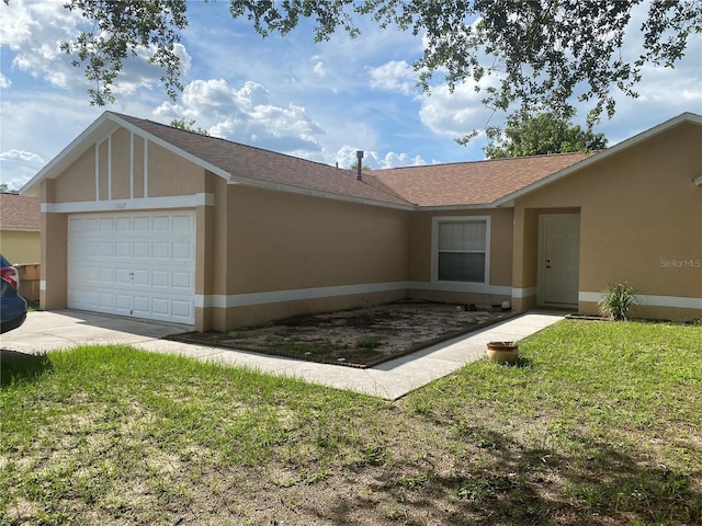 13327 Caspian Ln, Clermont, FL 34711 - view of front of home featuring a garage, a front yard, concrete driveway, and a shingled roof