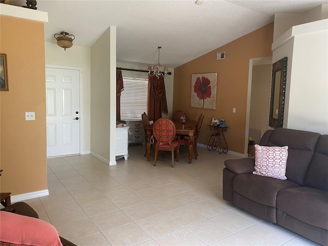 13327 Caspian Ln, Clermont, FL 34711 - living room with lofted ceiling and light tile patterned floors