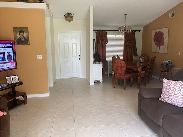 13327 Caspian Ln, Clermont, FL 34711 - living area with a chandelier and light tile patterned floors