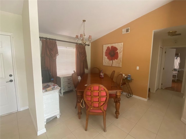 13327 Caspian Ln, Clermont, FL 34711 - dining area with a chandelier, lofted ceiling, and light tile patterned floors
