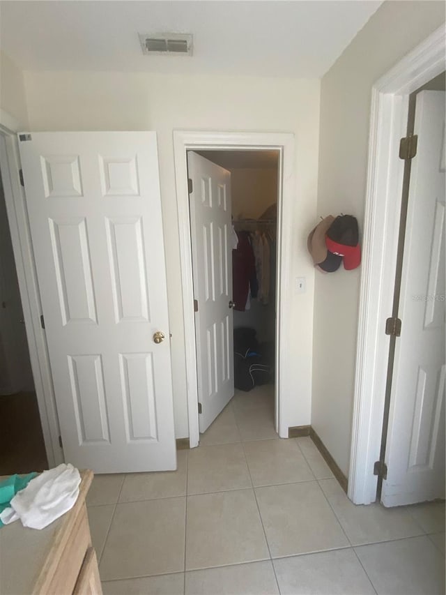 13327 Caspian Ln, Clermont, FL 34711 - hall with light tile patterned flooring