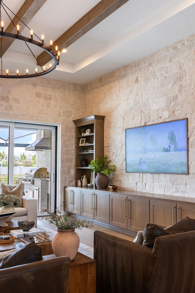 9352 Santorini Dr, Orlando, FL 32827 - living area with beamed ceiling and a chandelier