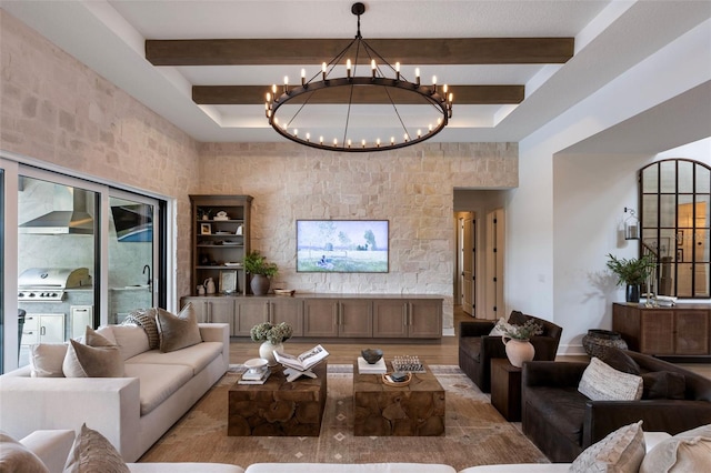 9352 Santorini Dr, Orlando, FL 32827 - living area featuring a chandelier, beamed ceiling, and light wood-style flooring