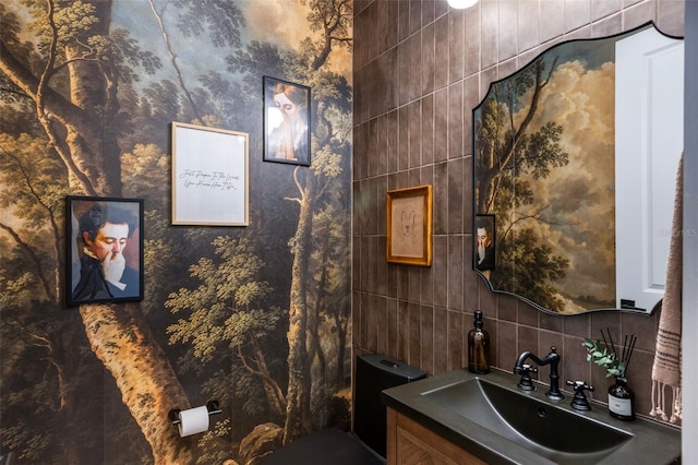 9352 Santorini Dr, Orlando, FL 32827 - bathroom featuring vanity and tasteful backsplash