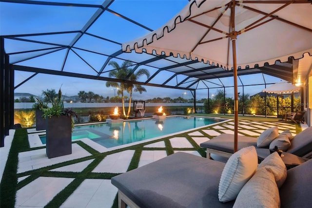 9352 Santorini Dr, Orlando, FL 32827 - view of swimming pool featuring a patio, a pool with connected hot tub, and glass enclosure