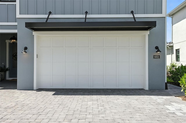 9352 Santorini Dr, Orlando, FL 32827 - garage with decorative driveway