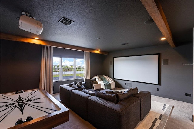 9352 Santorini Dr, Orlando, FL 32827 - home theater featuring light colored carpet and a textured ceiling