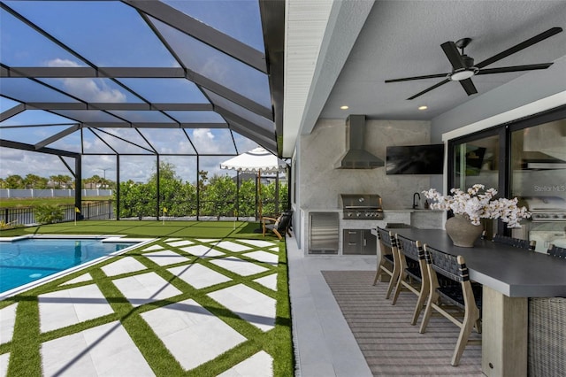 9352 Santorini Dr, Orlando, FL 32827 - view of patio / terrace featuring exterior kitchen, ceiling fan, and a lanai