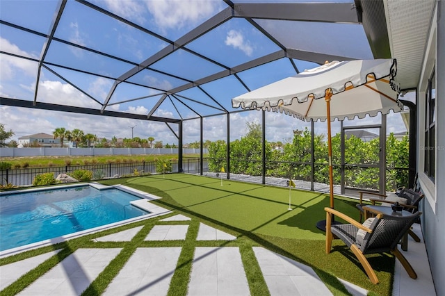 9352 Santorini Dr, Orlando, FL 32827 - view of swimming pool featuring an area to practice putting, a patio, and a lanai