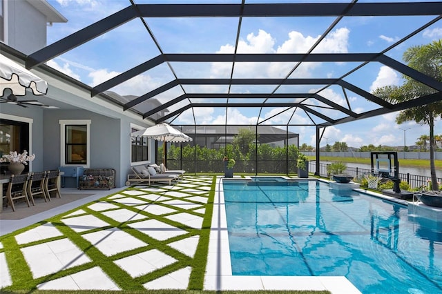 9352 Santorini Dr, Orlando, FL 32827 - view of swimming pool with a patio area, a pool with connected hot tub, glass enclosure, and ceiling fan