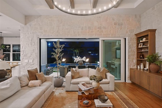 9352 Santorini Dr, Orlando, FL 32827 - living area with a chandelier and light wood finished floors