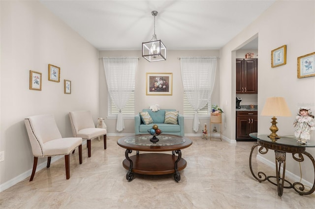 3837 Carrick Bend Dr, Kissimmee, FL 34746 - living area with a chandelier and healthy amount of natural light