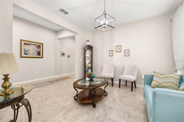 3837 Carrick Bend Dr, Kissimmee, FL 34746 - living area with a chandelier and light marble finish floors