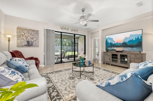 3837 Carrick Bend Dr, Kissimmee, FL 34746 - living room featuring baseboards and ceiling fan