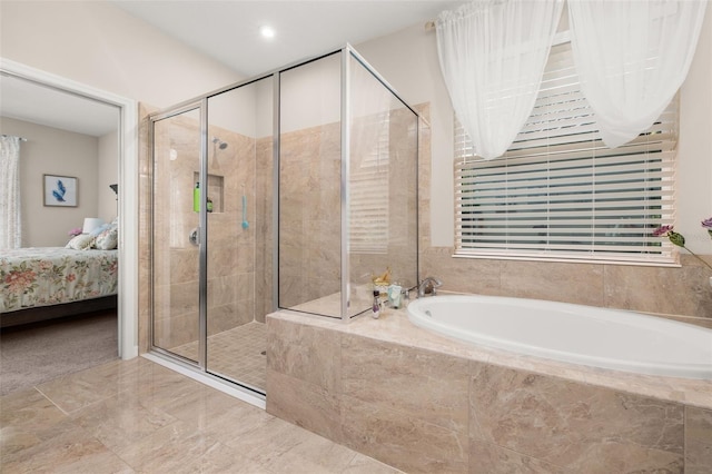 3837 Carrick Bend Dr, Kissimmee, FL 34746 - bathroom featuring a bath, ensuite bathroom, a shower stall, and marble finish flooring