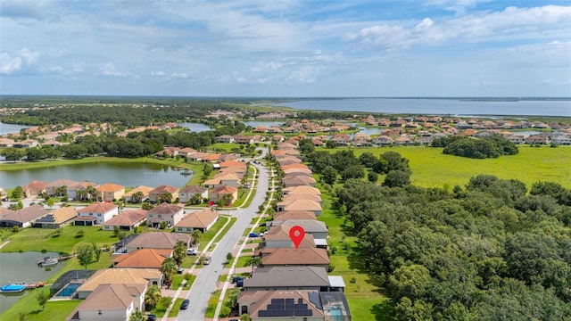 3837 Carrick Bend Dr, Kissimmee, FL 34746 - aerial view of residential area featuring a nearby body of water