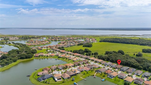 3837 Carrick Bend Dr, Kissimmee, FL 34746 - aerial perspective of suburban area with a large body of water