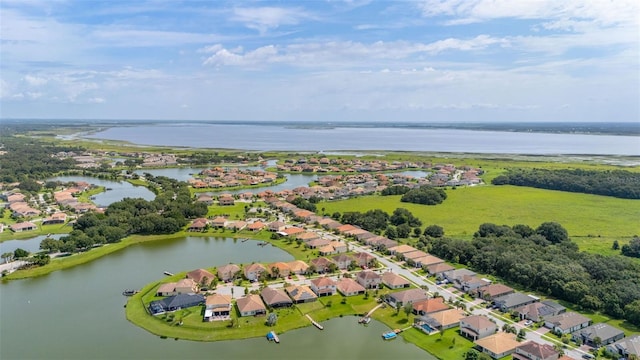 3837 Carrick Bend Dr, Kissimmee, FL 34746 - aerial perspective of suburban area with a large body of water