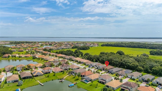 3837 Carrick Bend Dr, Kissimmee, FL 34746 - aerial perspective of suburban area featuring a nearby body of water