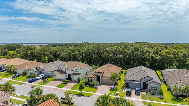 3837 Carrick Bend Dr, Kissimmee, FL 34746 - aerial view of residential area featuring a forest