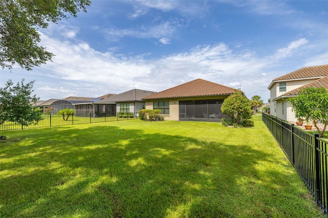 3837 Carrick Bend Dr, Kissimmee, FL 34746 - fenced backyard featuring a sunroom