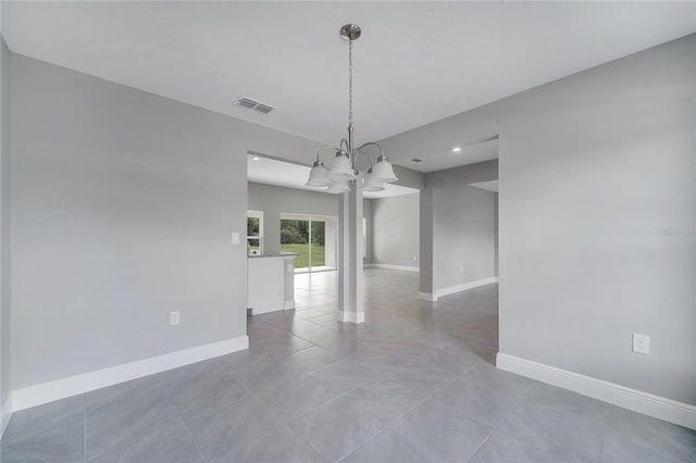 547 Viceroy Ct, Kissimmee, FL 34758 - spare room with a chandelier, recessed lighting, and light tile patterned floors