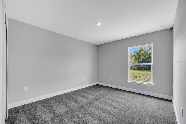 547 Viceroy Ct, Kissimmee, FL 34758 - unfurnished room featuring dark colored carpet and recessed lighting