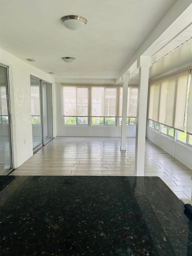 12215 Cobble Stone Dr, Hudson, FL 34667 - unfurnished sunroom with healthy amount of natural light
