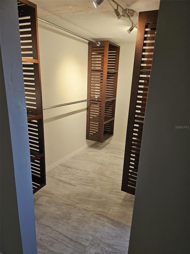 12215 Cobble Stone Dr, Hudson, FL 34667 - corridor with baseboards