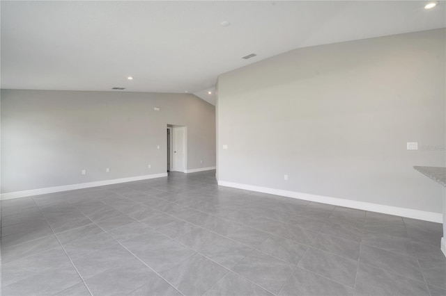 549 Viceroy Ct, Kissimmee, FL 34758 - unfurnished room featuring lofted ceiling and recessed lighting