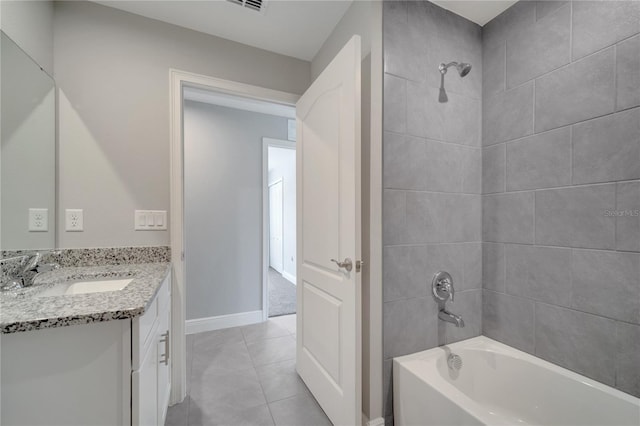 549 Viceroy Ct, Kissimmee, FL 34758 - full bath featuring vanity, shower / tub combination, and tile patterned flooring