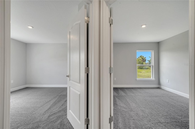549 Viceroy Ct, Kissimmee, FL 34758 - hallway with carpet and recessed lighting